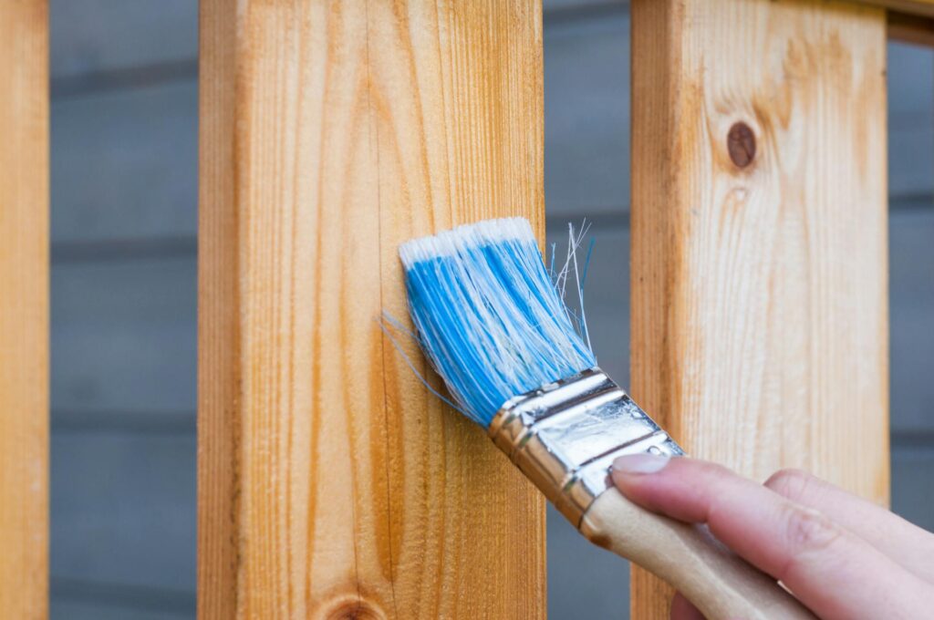 Painting the cabinets for the low-cost kitchen makeover 